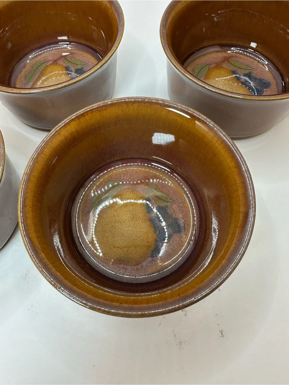 Set of 4 Denby Orchard Stoneware Ramekins feature a glossy brown Glaze.